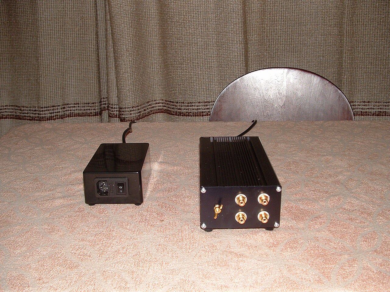 A separate phono stage box with its RCA inputs and outputs.